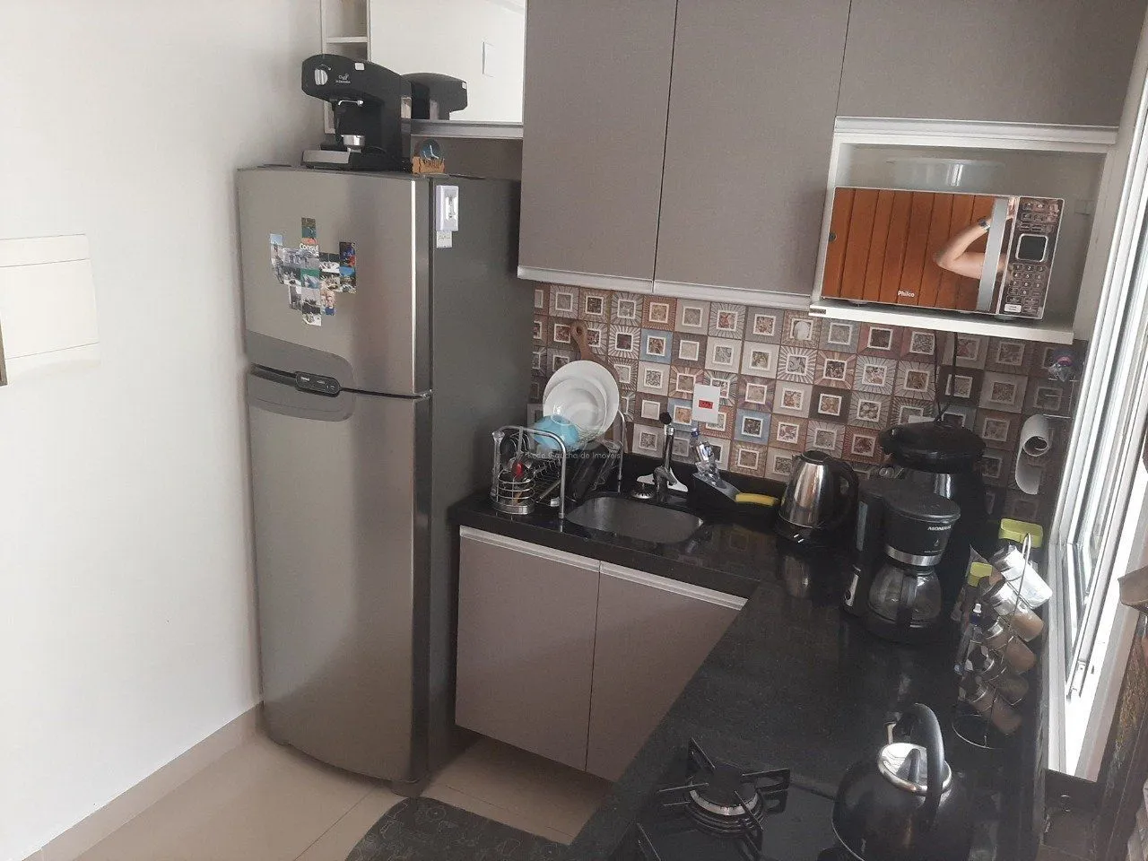 Imagem Casa com 2 quartos, 2 suítes, varanda, vaga, no bairro Aberta dos Morros, Poa/RS