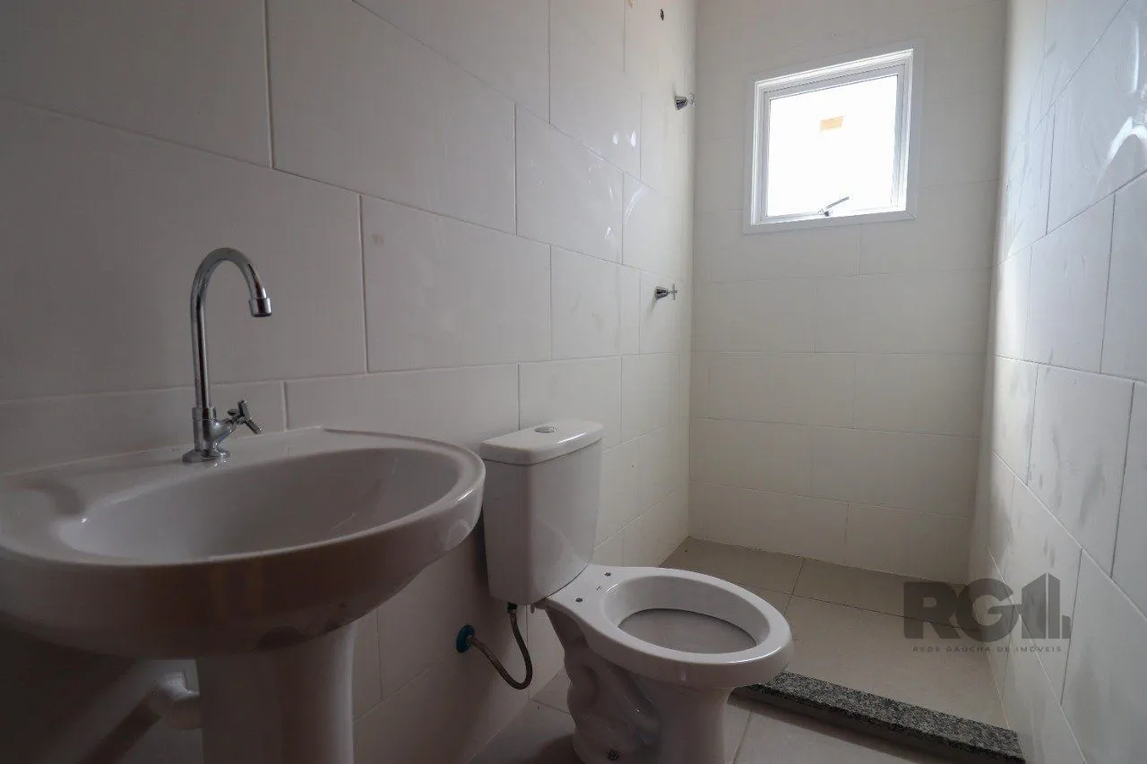 Imagem CASA ESTILO SOBRADO COM 2 QUARTOS E PÁTIO, À VENDA NO BAIRRO VILA NOVA, EM PORTO ALEGRE/RS