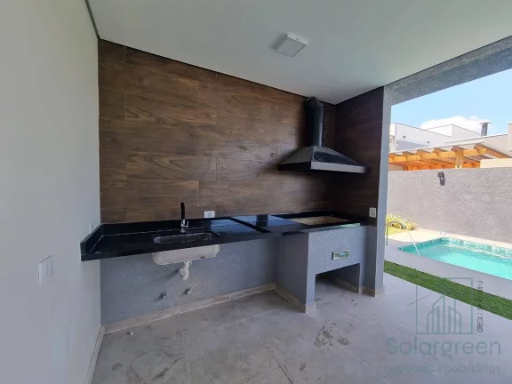 Imagem Casa 3 suítes e 4 vagas garagem, piscina , Condomínio Terras de Atibaia 1