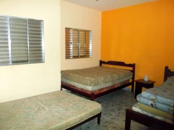 Imagem casa lado praia- tres dormitorios