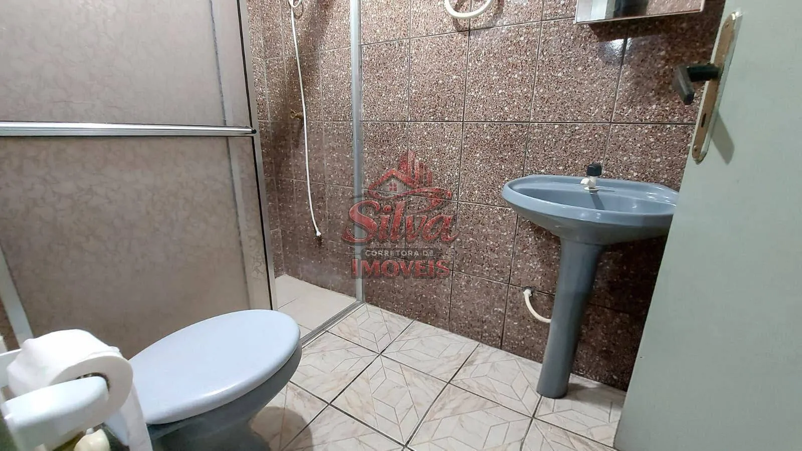 Imagem Casa com suíte à venda em Imbé com lareira e 103m²
