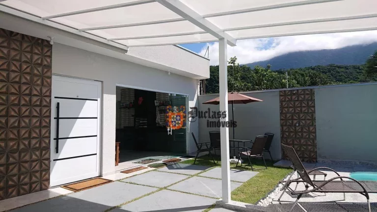 Imagem Casa com 3 dormitórios à venda, 107 m² por R$ 890.000,00 - Massaguaçu - Caraguatatuba/SP