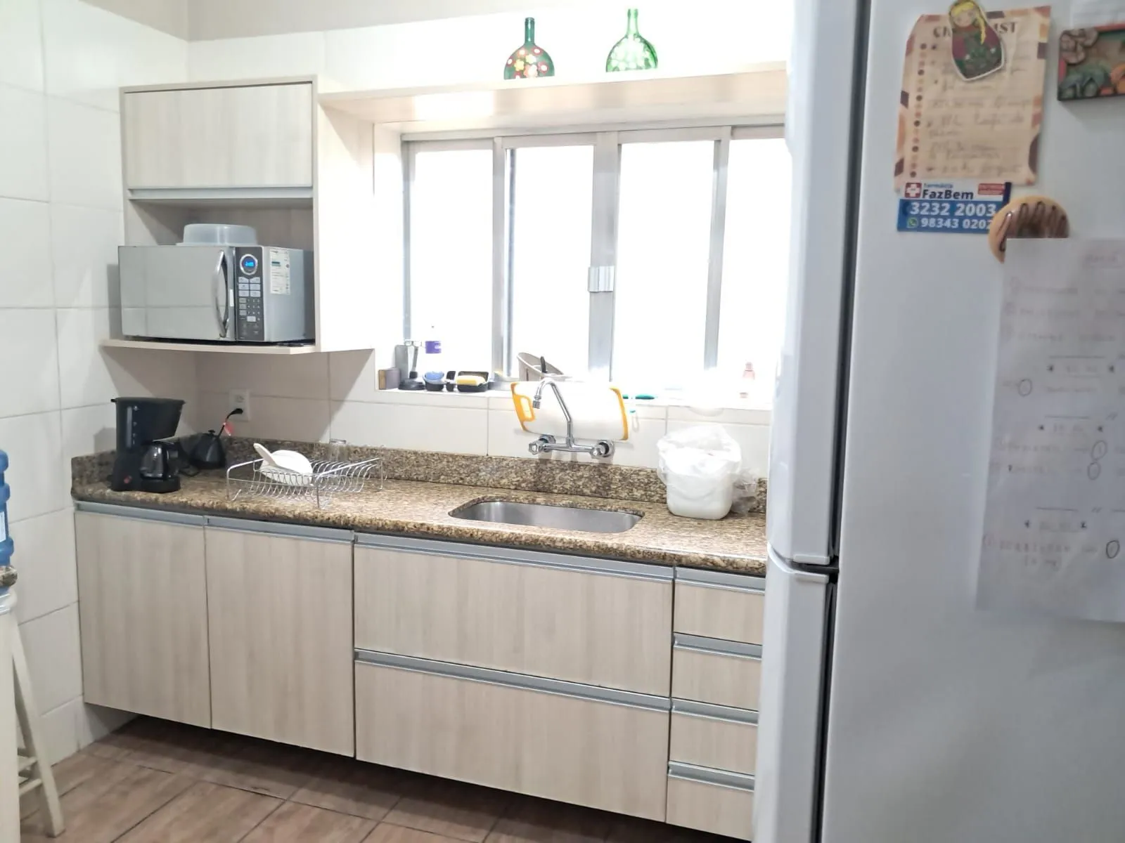 Imagem Terreno com 2 casas, totalizando 434,72m2. Excelente lotalização no coração do Menino Deus