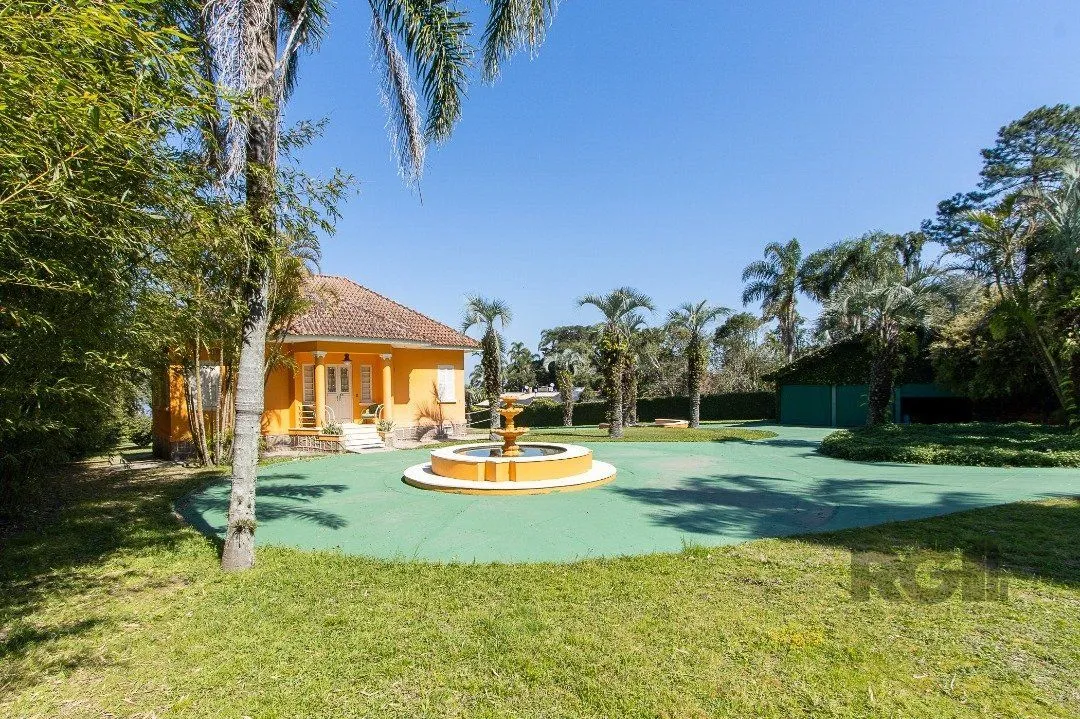 Imagem Terreno de 5.200m², rodeado pela natureza, possuindo 482m² de área construída