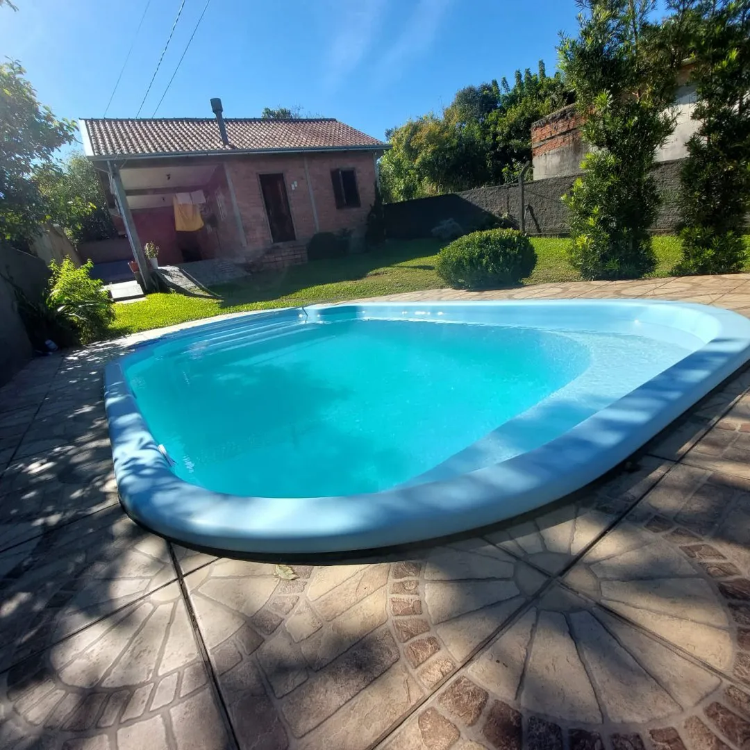 Imagem Casa com Piscina à Venda em Santo Onofre, Viamão