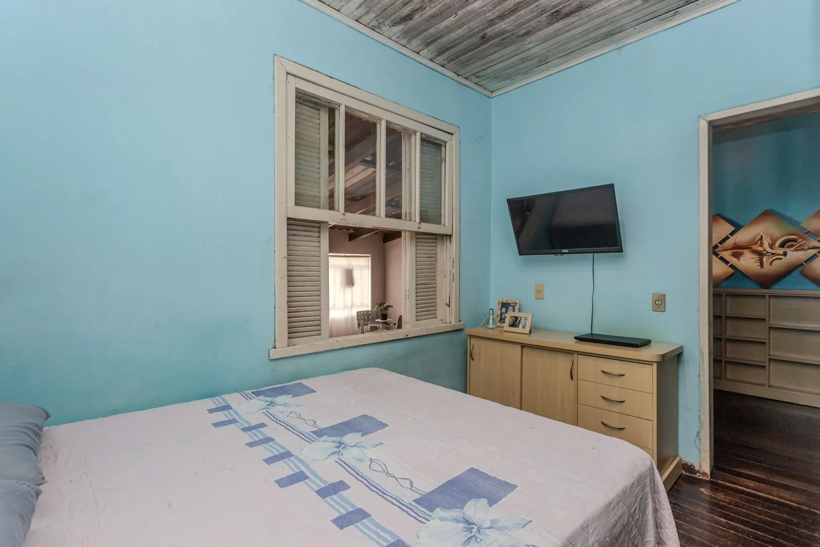 Imagem Casa no bairro Jardim Botânico de 3 dormitórios e garagem e terreno com 370m²