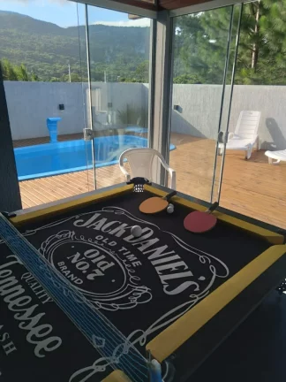 Imagem Casa de Alto Padrão em Garopaba-SC: 3 Dorms, Piscina, 275m², Próx. ao Centro e Praias