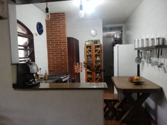 Imagem Casa com 4 dormitórios à venda, 160 m² por R$ 1.000.000 - Balneário Praia do Pernambuco - Guarujá/SP