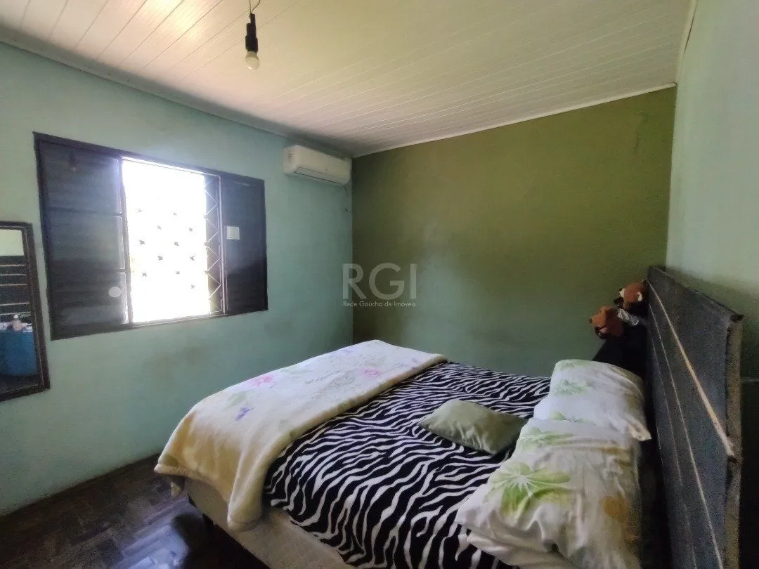 Imagem Casa para Venda - 100m², 3 dormitórios, 2 vagas - Lomba do Pinheiro