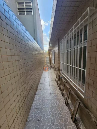 Imagem Casa com 3 dormitórios à venda, 192 m² por R$ 850.000 - Vila Valença - São Vicente/SP