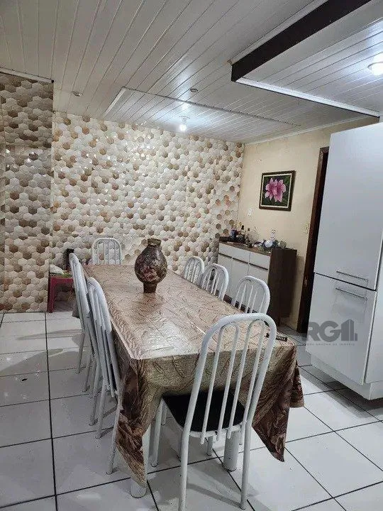 Imagem Casa com 4 quartos, 1 suíte, 7 vagas - 97,32m² no bairro Jardim Carvalho, Poa/RS