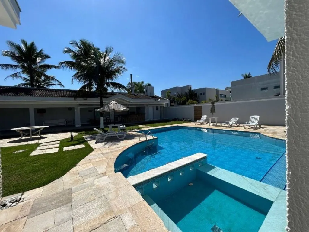 Imagem Alugar casa em condomínio em Jardim Acapulco Guarujá SP, casa á venda em Guarujá SP
