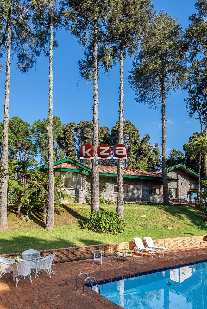Imagem Imóvel de luxo à venda em Campos do Jordão-SP: Casa com 6 quartos, 4 suítes, 3 salas e 8 banheiros no bairro Toriba