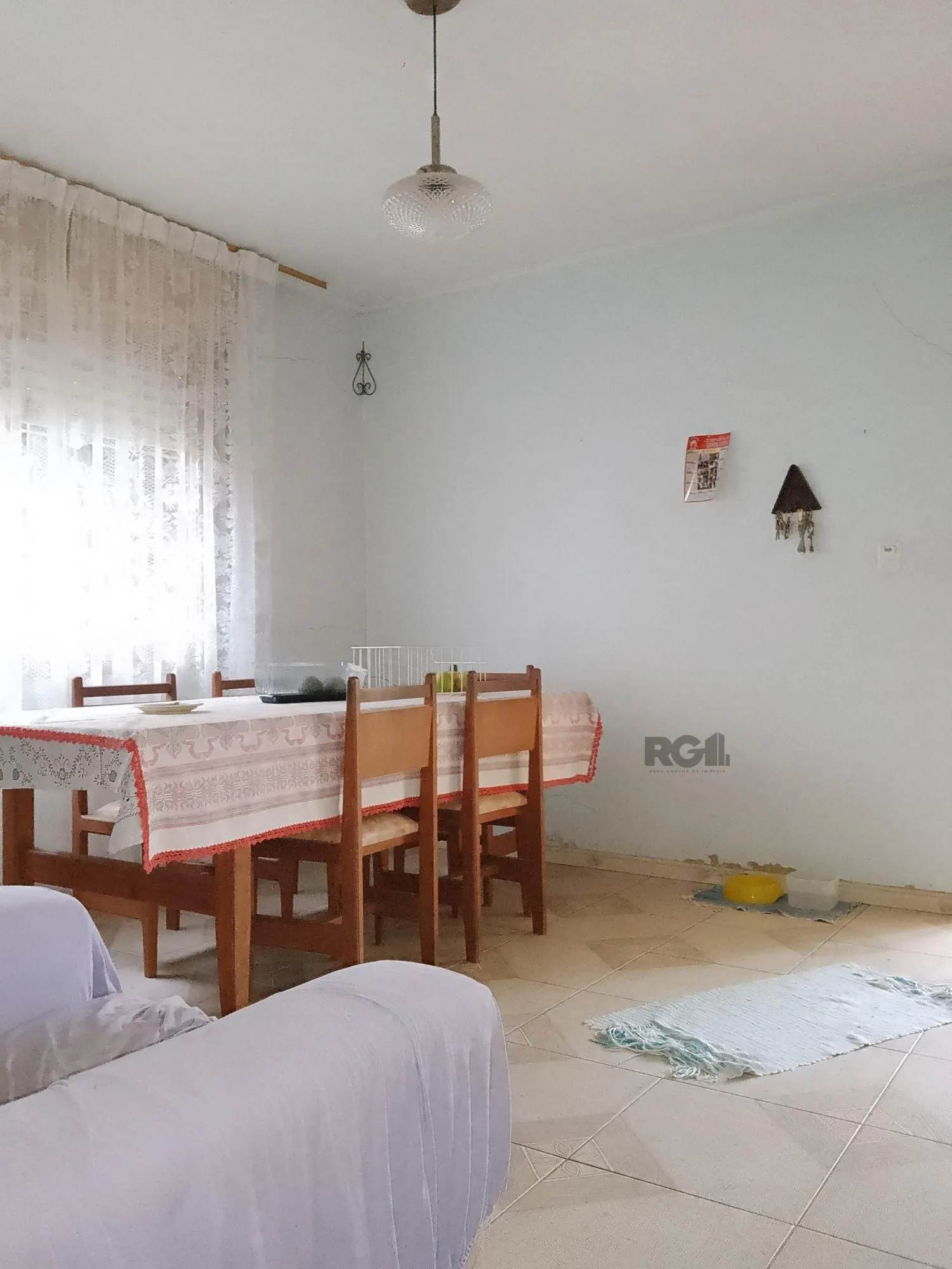 Imagem Casa 4 dormitórios, terreno com 1639m² à venda no Morro Santana