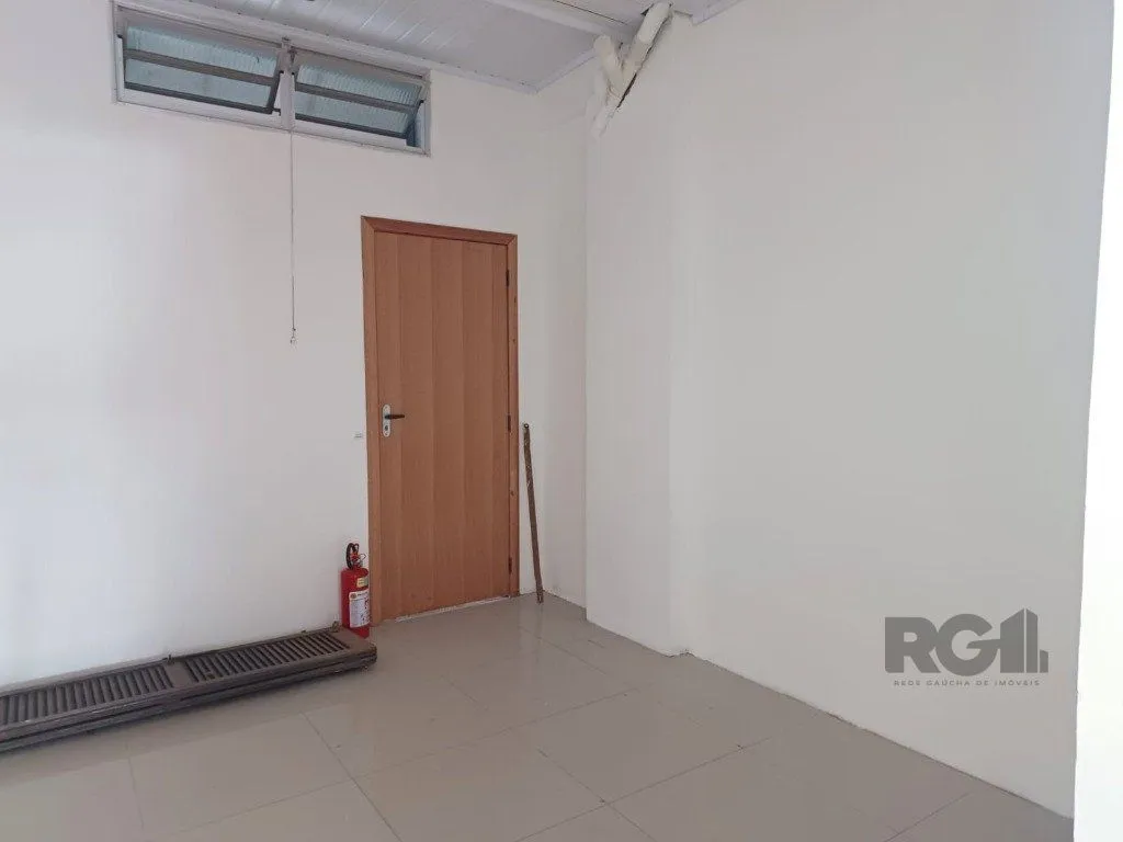 Imagem Sala de frente com vaga