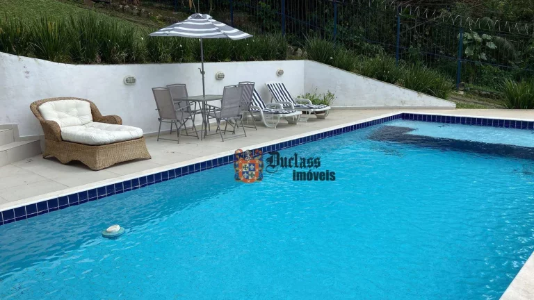 Imagem Casa com 3 dormitórios à venda, 290 m² por R$ 1.600.000 - Prainha - Caraguatatuba/SP