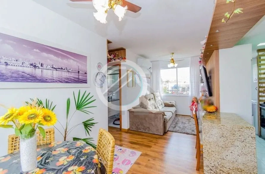 Apartamento com 57m², dois dormitórios sendo uma suíte, living, cozinha tipo americana, área de ...