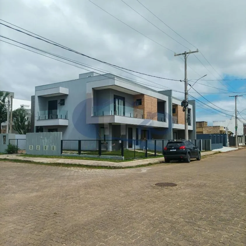 Imagem Sobrado semimobiliado de 2 suites a venda no Morada das Palmeiras, em Torres/RS