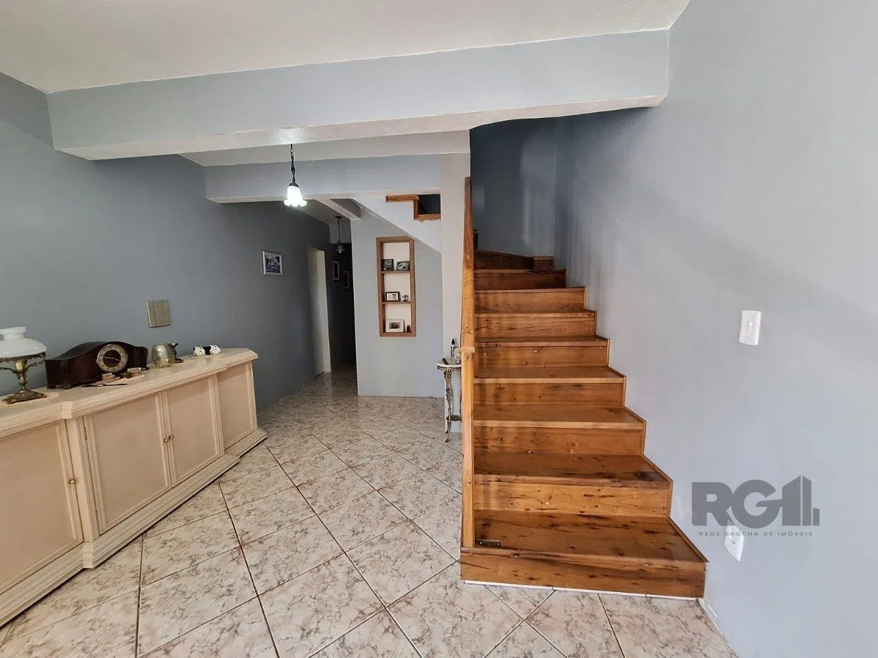 Imagem Casa com 3 dormitórios, suíte, lareira, Jardim Algarve em Alvorada - RS.