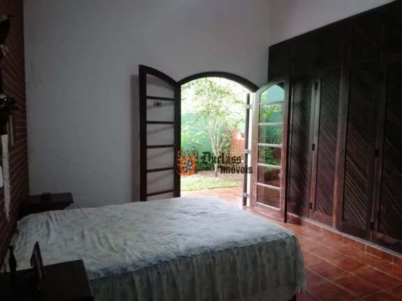 Imagem Casa com 4 dormitórios à venda, 160 m² por R$ 1.000.000 - Balneário Praia do Pernambuco - Guarujá/SP