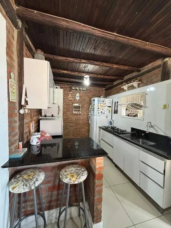 Imagem Residência de Luxo no Cantegril com 4 Dormitórios, 2 Suítes, Piscina e Espaço Gourmet Exclusivo