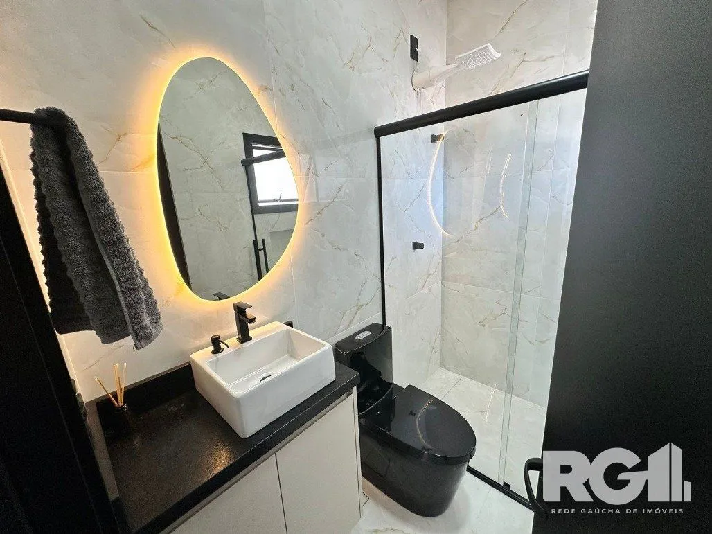 Imagem Casa de alto padrão a venda, totalmente mobiliada, com 2 dormitórios, 1 suite e 2 vagas no centro de Nova Santa Rita.