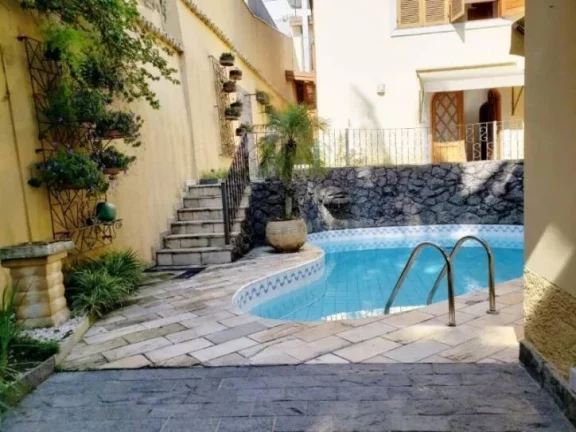 Imagem MAGNÍFICA RESIDÊNCIA * 5 SUÍTES * 5 GARAGENS * RUA TRANQUILA * SUPER SEGURA