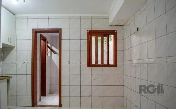 Imagem Casa em condominio no bairro Tristeza de 3 dormitórios e vaga