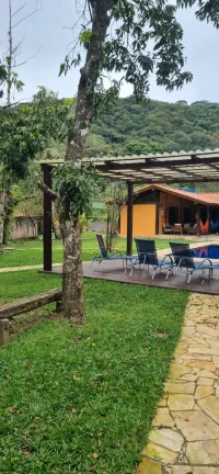 Imagem , CAMBURY,LINDO SÍTIO COM 1500MT .4 SUITES SALA COZINHA LAREIRA PISCINA SAUNA ÁREA GOURMET EXTERNA LINDO GRAMADO ,CANIL