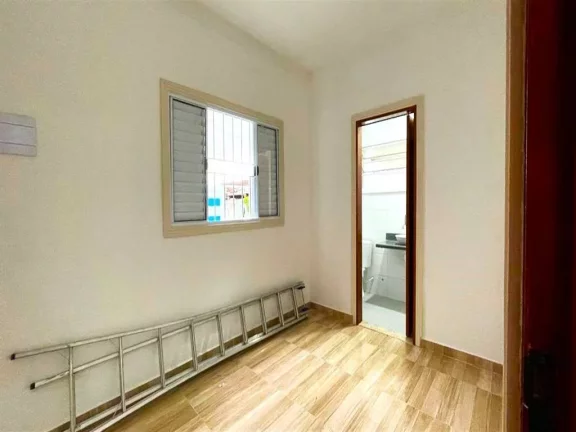 Imagem Casa com 2 dormitórios à venda, 130 m² por R$ 400.000 - Caiçara - Praia Grande/SP