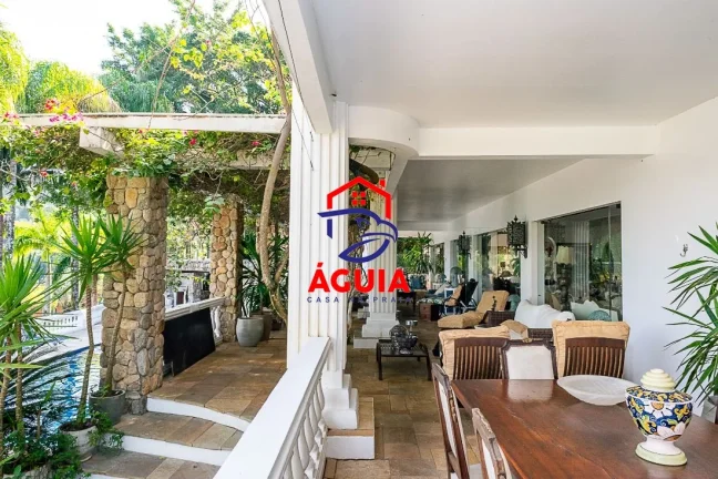 Imagem Belíssima casa em condomínio fechado em meio a Mata Atlântica com vista para o mar!!