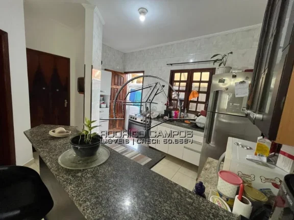 Imagem Casa Térrea à Venda na Aviação Praia Grande - 1 Quarto e Garagem