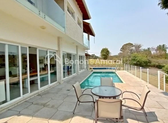 Imagem Casa luxuosa e moderna à venda em terreno de 1.270 m² com 600 m² de área construída, oferecendo...