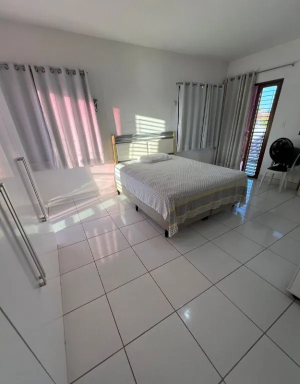 Imagem Casa duplex ampla no Bairro dos Estados, com 7 quartos, 4 suítes, varandas, terraço e excelente localização em João Pessoa.