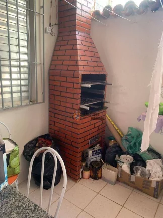 Imagem Casa com 3 dormitórios à venda, 100 m² por R$ 590.000 - Ocian - Praia Grande/SP