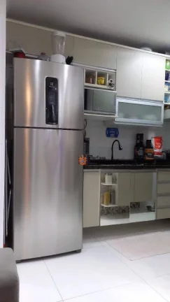 Imagem Apartamento com 2 dormitórios à venda, 56 m² por R$ 360.000 - Caiçara - Praia Grande/SP
