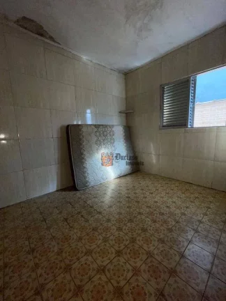 Imagem Casa com 2 dormitórios à venda por R$ 400.000 - Catiapoã - São Vicente/SP
