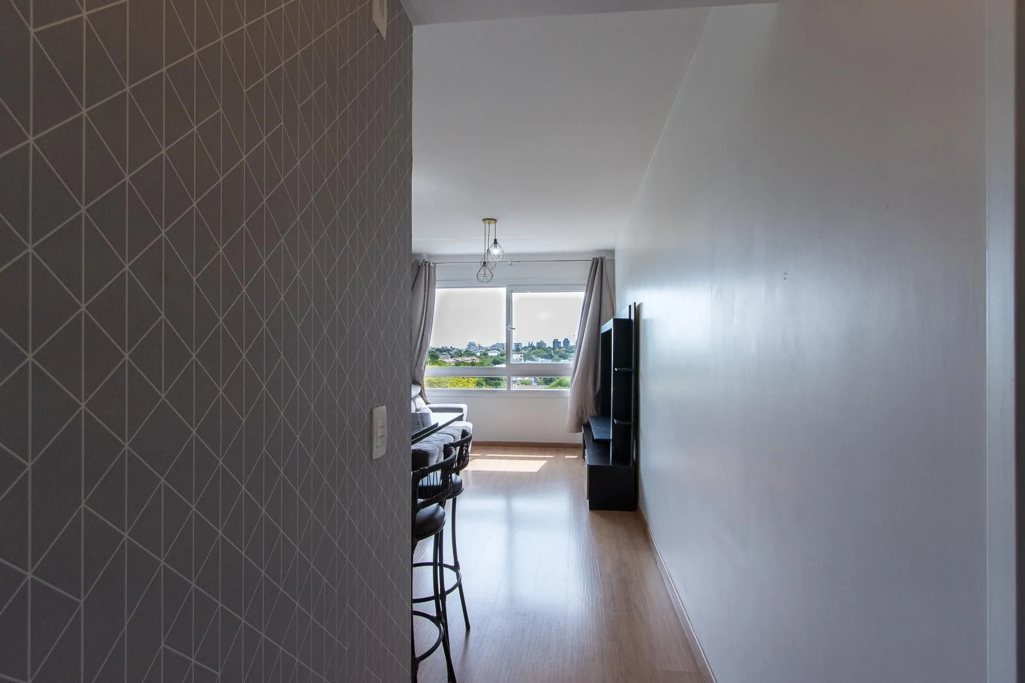 Imagem Apartamento de 2 dormitórios com suíte, churrasqueira e infraestrutura completa na Zona Sul de Porto Alegre.