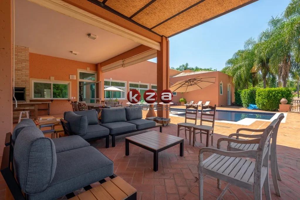 Imagem Luxuosa mansão de alto padrão a venda no Condomínio Terras de São José em Itu- SP, com 5 suítes, amplo gourmet com piscina e 1.500m² de área.