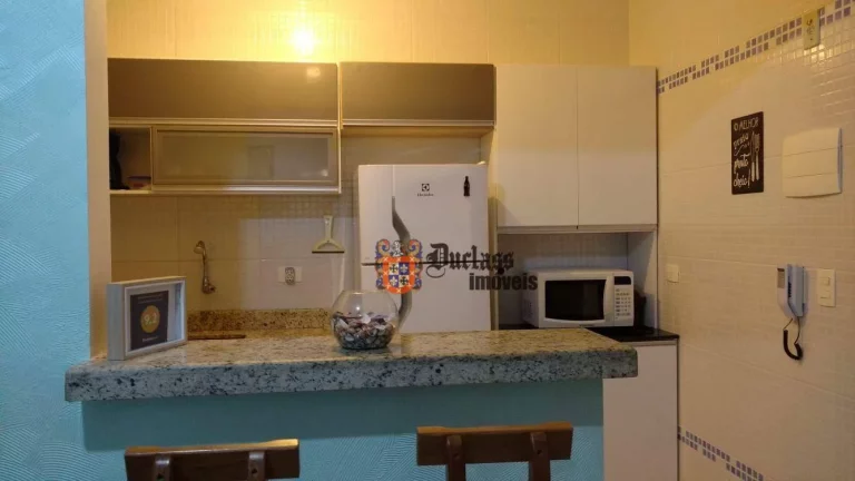 Imagem Apartamento com 1 dormitório à venda, 47 m² por R$ 299.000 - Caiçara - Praia Grande/SP