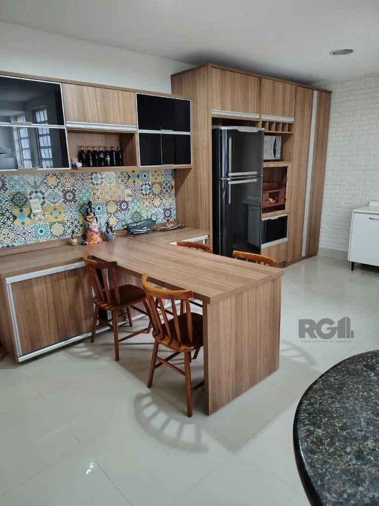 Imagem Casa sobrado com 300m² na Vila Nova de 3 dormitórios e 4 vagas