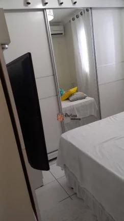 Imagem Apartamento com 2 dormitórios à venda, 56 m² por R$ 360.000 - Caiçara - Praia Grande/SP