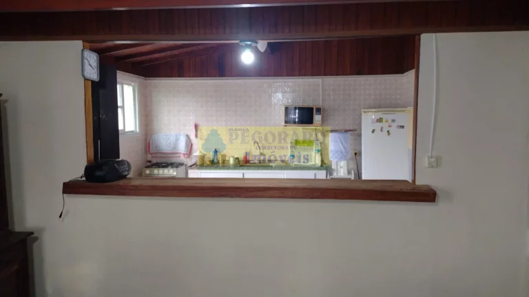 Imagem Imperdível Casa de 4 Quartos na Prainha, Caraguatatuba-SP: 2 Suítes, 2 Salas, 4 Banheiros, 4 Vagas de Garagem!