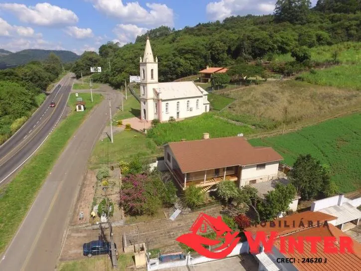 Imagem Casa de 4 dorm com 2 box ao lado da igreja de Arroio Feliz.