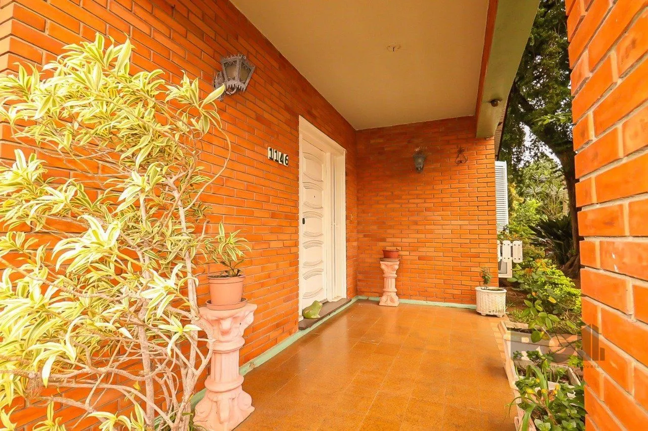 Imagem Casa com 2 quartos, vaga de garagem, churrasqueira, com 200m² privativos no centro de Esteio/RS