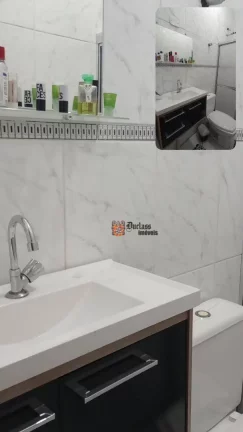 Imagem Casa com 2 dormitórios à venda, 64 m² por R$ 390.000 - Vila Caiçara - Praia Grande/SP