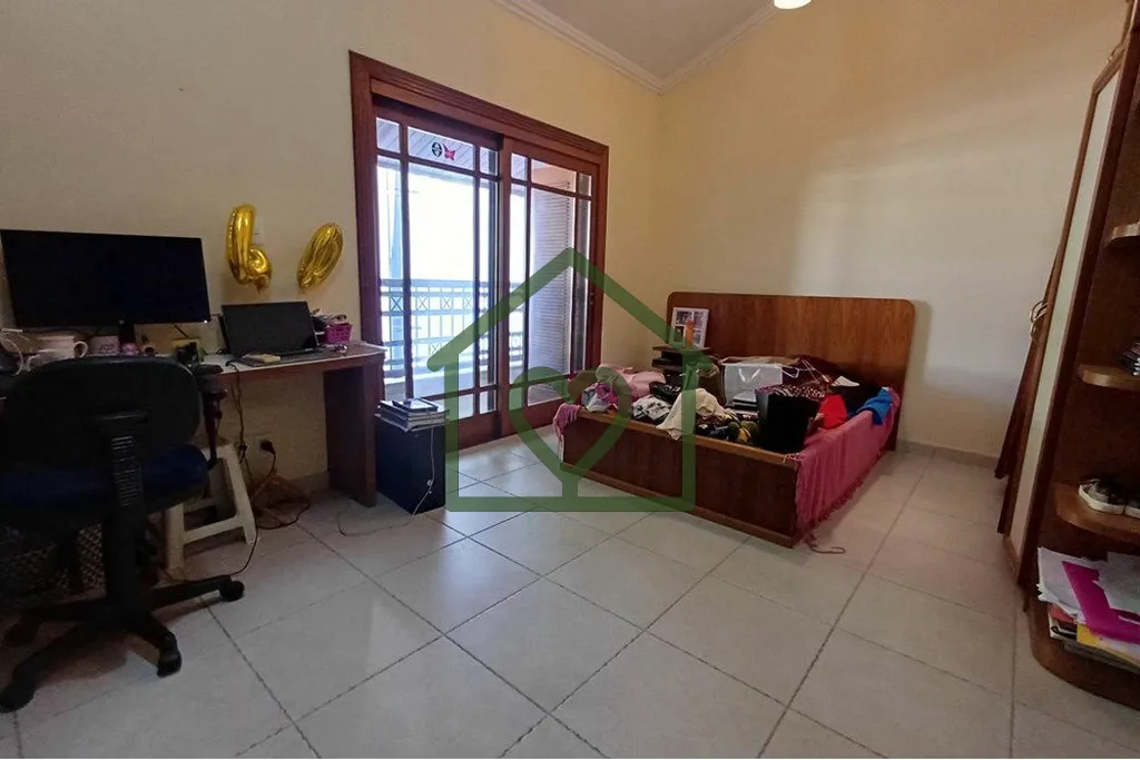 Imagem Desfrute do conforto e sofisticação com esta espetacular casa à venda no bairro Partenon, em Port...