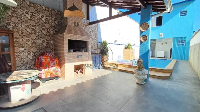 Imagem Espaçosa Casa Geminada no Mirim Praia Grande – 2 Quartos e Piscina