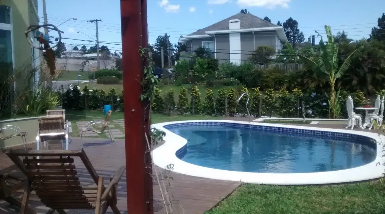 Imagem Luxuosa casa em condomínio à venda em Santana de Parnaíba, São Paulo-SP: 4 quartos, 2 suítes, 3 salas, 5 banheiros, 6 vagas, 480m².