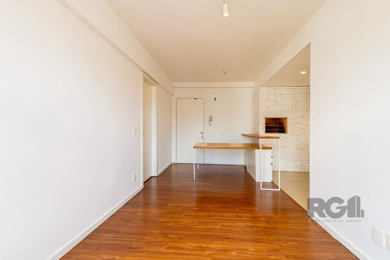 Imagem Apartamento de um quarto, suíte e uma vaga de garagem no bairro Santa Cecilia em Porto Alegre.